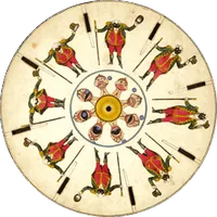 Play this disc — red-costumed figures around a ring of faces.